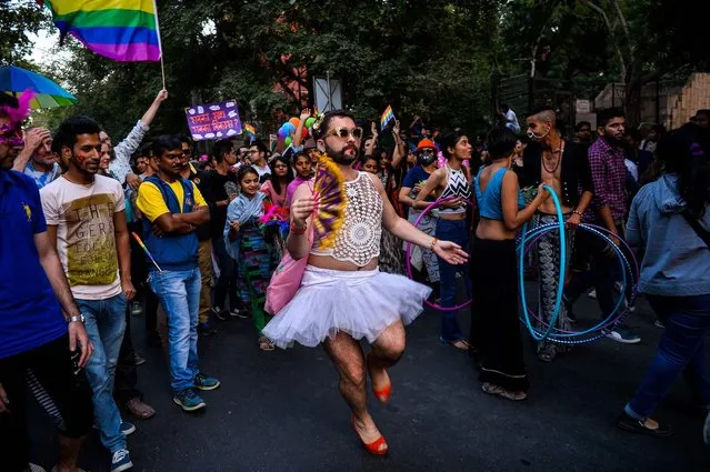 Indian members and supporters of the lesbian, gay, bisexual, transgender (LGBT) community take part in a pride parade in New Delhi on November 27, 2016
Hundreds of members of the LGBT community marched through the Indian capital for the ninth annual Delhi Queer Pride Parade. (Photo by Chandan Khanna/AFP Photo)
