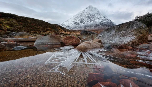 Ice spikes, Glencoe, by Pete Rowbottom: “I had set out to shoot sunrise upriver and, with the freezing weather, I was hoping to find frozen pools of ice with radiating lines that I could use as foreground. The sunrise wasn’t the best but walking along the river I saw this unusual and dramatic formation, and knew I had my spot”. Overall winner. (Photo by Pete Rowbottom/Landscape Photographer of the Year)