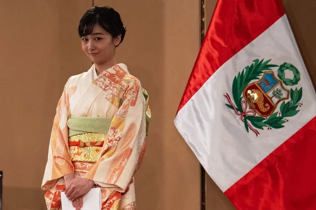 Japan's Princess Kako, daughter of Crown Prince Akishino, gestures during a commemorative act to celebrate the 150 years of diplomatic relations between Peru and Japan at the Peruvian Japanese Association in Lima, on November 3, 2023. Princess Kako of Japan, niece of Emperor Naruhito, began a six-day official visit to Peru this Friday as part of the 150 years of the establishment of diplomatic ties between the Asian nation and the Latin American country. (Photo by Cris Bouroncle/AFP Photo)