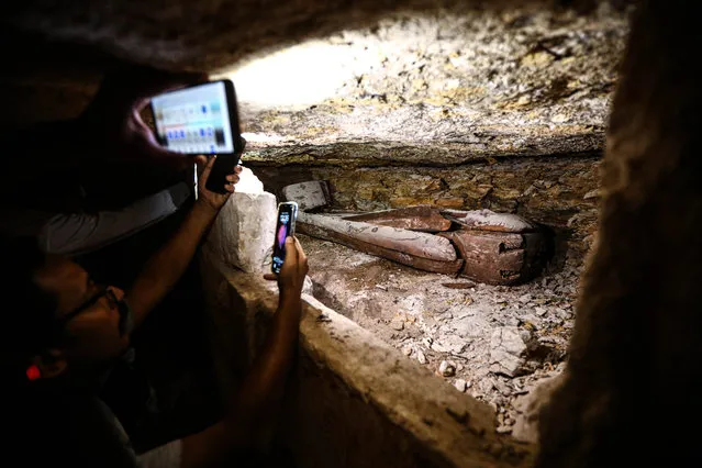 This photo taken on October 15, 2023 shows a mummy coffin inside a rock-cut tomb at a cemetery in Minya Governorate, Egypt. A cemetery dating back to the New Kingdom of ancient Egypt was unearthed at Tuna El-Gebel necropolis in southern Egypt's Minya governorate, the Egyptian Ministry of Tourism and Antiquities announced on Sunday. (Photo by Xinhua News Agency/Rex Features/Shutterstock)