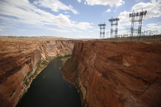 The Colorado River flows from the Glen Canyon Dam on Lake Powell outside Page, Arizona, April, 14, 2015. (Photo by Jim Urquhart/Reuters)