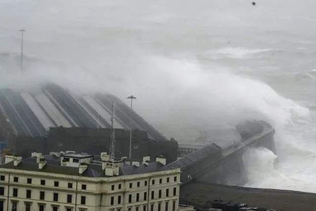 Waves crash over the harbour wall as Storm Ciaran brings high winds and heavy rain along the south coast of England, in Folkestone, Thursday, November 2, 2023. Winds up to 180 kilometers per hour (108 mph) slammed France's Atlantic coast overnight as Storm Ciaran lashed countries around western Europe, uprooting trees, blowing out windows and leaving 1.2 million French households without electricity Thursday. Strong winds and rain also battered southern England and the Channel Islands, where gusts of more than 160 kph (100 mph) were reported. (Photo by Gareth Fuller/PA Wire via AP Photo)