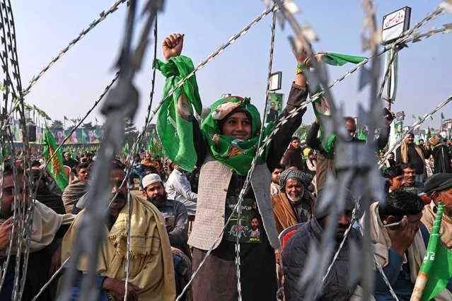 A young supporter of Nawaz Sharif, Pakistan's former Prime Minister and leader of the Pakistan Muslim League (PML) party, cheers during an election campaign rally in Hafizabad of Punjab province on January 18, 2024. (Photo by Arif Ali/AFP Photo)