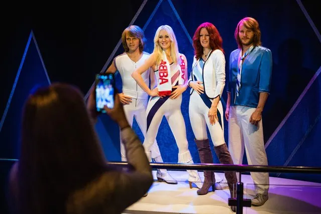 Swedish music band ABBA's wax figures are displayed at the ABBA museum in Stockholm, Sweden on November 5, 2021. ABBA's first album in 40 years, “The Voyage”, was released on November 5, 2021. (Photo by Jonathan Nackstrand/AFP Photo)