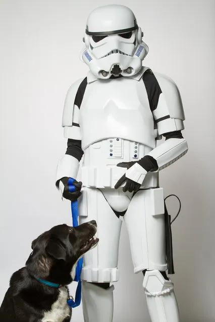 A Storm Trooper with a dog. (Photo by Rohit Saxena/Caters News)