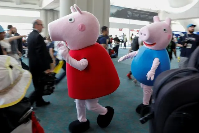 Attendees arrive in costumes to enjoy Comic Con International in San Diego, California, U.S., July 19, 2019. (Photo by Mike Blake/Reuters)