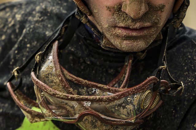 Mud cakes the face and goggles of Jockey Raymond Handal after riding Whenlovetakesover in the Ali May Arcoleo Memorial Race ahead of the 149th running of the Preakness Stakes at Pimlico Race Course on May 18, 2024 in Baltimore, MD. (Photo by Samuel Corum/Getty Images)