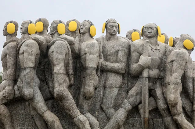 Photo taken on April 26, 2017 shows the statues adorned with auditive protectors marking the International Noise Awareness Day, in Sao Paulo, Brazil, on April 26, 2017. The International Noise Awareness Day is celebrated annually the last Wednesday of April, and was created by the Center for Hearing and Communication (CHC) in 1996 to encourage people to combat noise pollution. (Photo by Rahel Patrasso/Xinhua/Barcroft Images)