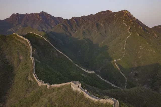 In an aerial view, the Huanghuacheng Great Wall is seen in the Huairou district on April 19, 2022 in Beijing, China. Huanghuacheng is the only village with a lakeside by the Great Wall which is a popular section for tourism. (Photo by Lintao Zhang/Getty Images)