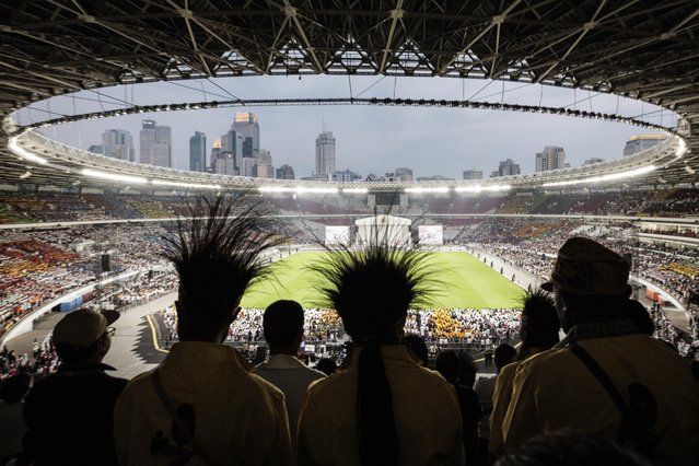 Catholic faithful attend a holy mass led by Pope Francis at the Gelora Bung Karno Stadium in Jakarta on September 5, 2024. (Photo by Yasuyoshi Chiba/AFP Photo)