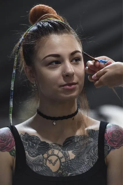 A girl at the 6th Siberian Tattoo Festival at Podzemka Loft Park in Novosibirsk, Russia on August 20, 2017. (Photo by Kirill Kukhmar/TASS)