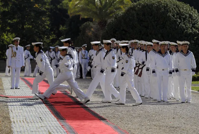 Bulgarian sailors prepare for the welcoming ceremony for French President Emmanuel Macron at the Euxinograd residence outside Varna, Bulgaria, Friday, August 25, 2017. (Photo by Vadim Ghirda/AP Photo)