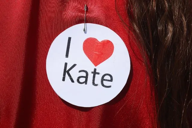 A participant dressed as singer Kate Bush from her 1978 video to her song “Wuthering Heights” wears an “I love Kate” pin prior to attempting to create a new world's record for the most people dancing in costume to the song at once at Tempelhofer Feld park on July 16, 2016 in Berlin, Germany. (Photo by Sean Gallup/Getty Images)