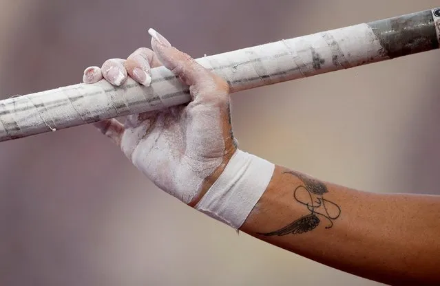 General view of the tattoo on the wrist of Canada's Anicka Newell during women's pole vault final at the Commonwealth Games at Alexander Stadium in Birmingham, Britain on August 2, 2022. (Photo by John Sibley/Reuters)