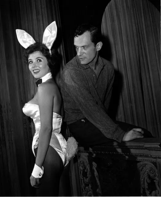 In this June 20, 1961 file photo, Playboy magazine publisher Hugh Hefner poses with “bunny-girl” hostess Bonnie J. Halpin at Hefner's nightclub in Chicago. Playboy founder and sexual revolution symbol Hugh Hefner has died at age 91. The magazine released a statement saying Hefner died at his home in Los Angeles of natural causes on Wednesday night, Sept. 27, 2017, surrounded by family. (Photo by Ed Kitch/AP Photo)