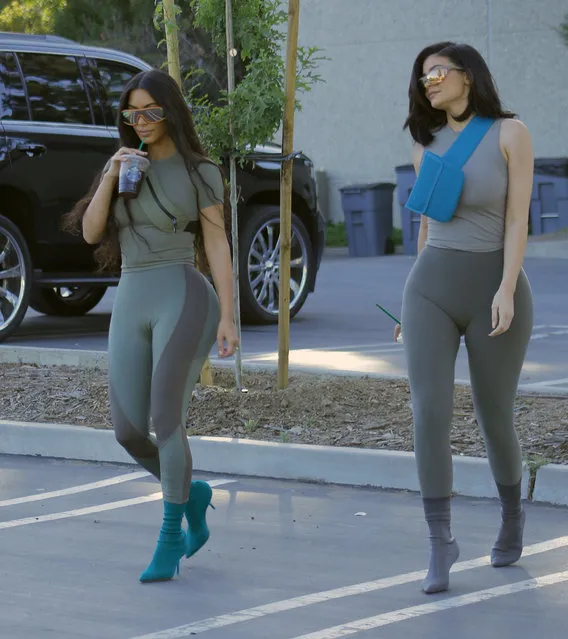 Kim Kardashian and Kylie Jenner arrive for a photoshoot in Los Angeles, CA. on June 12, 2018. They had a vintage Ford Bronco on hand for the shoot also. (Photo by Splash News and Pictures)