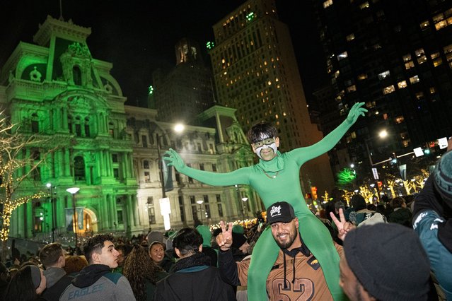 Philadelphia Eagles fans celebrate near Philadelphia City Hall after the team defeated the Washington Commanders in the NFC Championship NFL football game on January 26, 2025. (Photo by AP Photo)