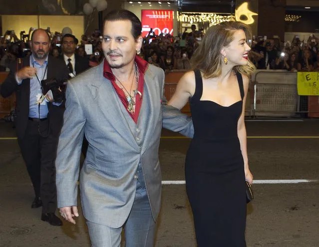 Actors Johnny Depp and his wife Amber Heard arrive for the premiere of “Black Mass” at TIFF the Toronto International Film Festival in Toronto, September 14, 2015. (Photo by Fred Thornhill/Reuters)