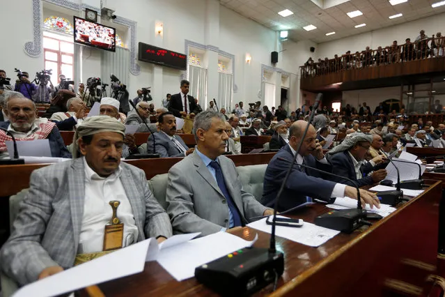 Members of Yemen's parliament attend parliament for the first time since a civil war began almost two years ago in Sanaa, Yemen August 13, 2016. (Photo by Khaled Abdullah/Reuters)