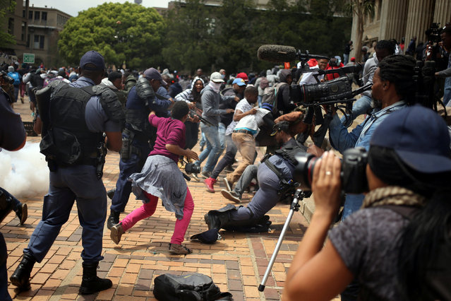 Students clash with South African police at Johannesburg's University of the Witwatersrand, South Africa, October 4, 2016. (Photo by Siphiwe Sibeko/Reuters)