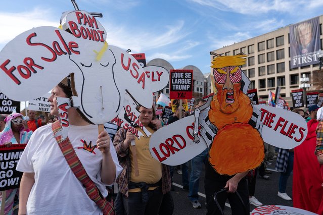 Demonstrators march towards the U.S. Capitol during a Trump Must Go Now rally in Washington, Wednesday, November 5, 2025. (Photo by Jose Luis Magana/AP Photo)