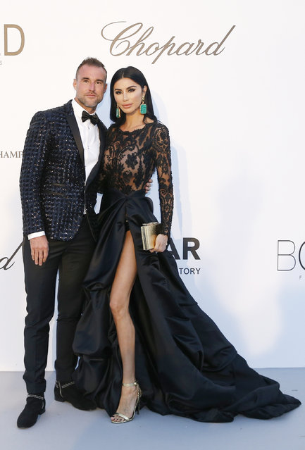 Philipp Plein and Morgan Osman arrive on May 17, 2018 for the amfAR 25 th Annual Cinema Against AIDS gala at the Hotel du Cap- Eden- Roc in Cap d' Antibes, southern France, during the 71 th Cannes Film Festival. (Photo by Stephane Mahe/Reuters)