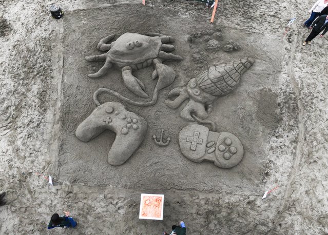 Thousands flock to Ocean Beach to build giant sand sculptures on 43rd annual Sandcastle classic and contest in San Francisco, California, United States on October 25, 2025. Sandcastle Classic, a San Francisco tradition, raises funds for high quality arts and architecture education for more than 8,500 Bay Area public school students. (Photo by Tayfun Cokun/Anadolu via Getty Images)