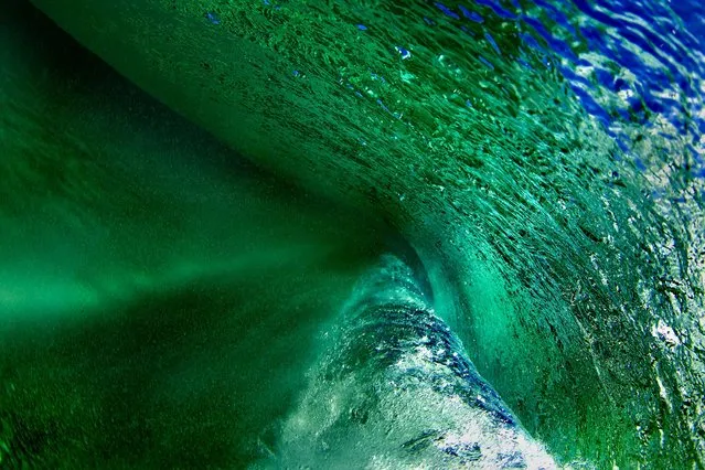 These incredible images capture the immense detail of waves beautifully crashing into the serene waters of Hawaii. (Photo by Bryce Groark/Caters)