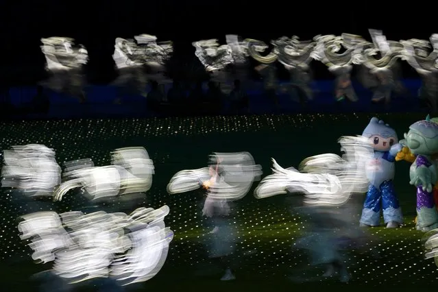 Dancers perform during the closing ceremony of the 19th Asian Games in Hangzhou, China, Sunday, October 8, 2023. (Photo by Aaron Favila/AP Photo)