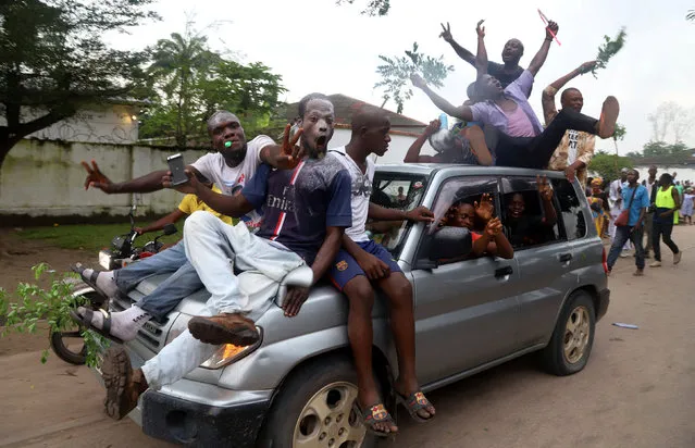 Supporters of Felix Tshisekedi, leader of the Congolese main opposition party, the Union for Democracy and Social Progress who was announced as the winner of the presidential elections; celebrate along the streets of Kinshasa, Democratic Republic of Congo, January 10, 2019. (Photo by Kenny Katombe/Reuters)