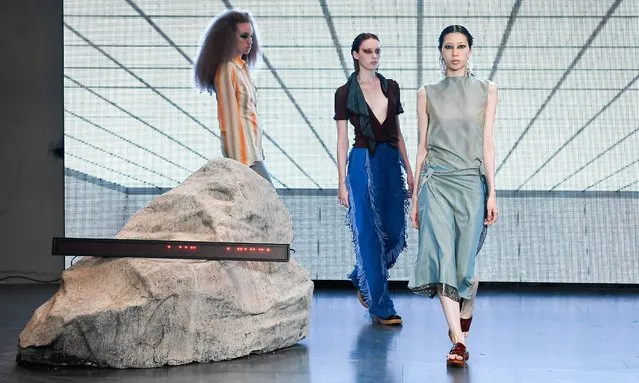 Models walk the runway during the Eftychia Ready to Wear Spring/Summer 2022 fashion nshow as part of the London Fashion Week on September 19, 2021 in London, England. (Photo by Rex Features/Shutterstock)