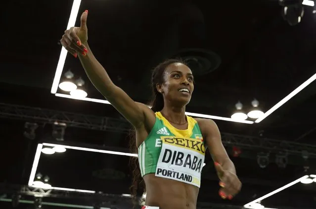 Genzebe Dibaba of Ethiopia celebrates after winning the women's 3000 meters final during the IAAF World Indoor Athletics Championships in Portland, Oregon March 20, 2016. (Photo by Lucy Nicholson/Reuters)