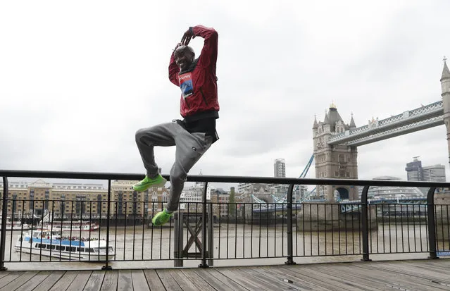 Britain's Mo Farah leaps as he poses for the media during a photo call for the London Marathon in London, Wednesday, April 24, 2019. Farah will take part in the 39th London Marathon which takes place Sunday April 28. (Photo by Alastair Grant/AP Photo)