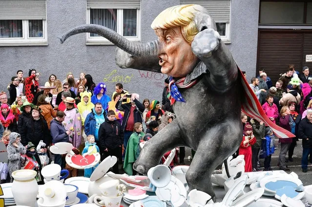 A float featuring U.S. President Donald Trump drives in the annual Rose Monday parade on February 27, 2017 in Mainz, Germany. Political satire is a traditional cornerstone of the annual parades and the ascension of Donald Trump to the U.S. presidency, the rise of the populist far-right across Europe and the upcoming national elections in Germany provided rich fodder for float designers this year. (Photo by Thomas Lohnes/Getty Images)