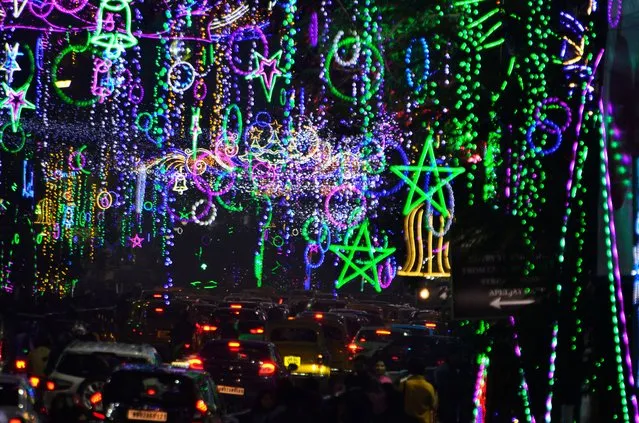 Light decorations can be seen in Kolkata, India, 31 December, 2021. (Photo by Indranil Aditya/NurPhoto via Getty Images)