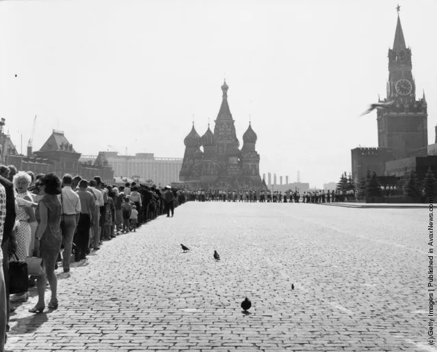 1950: Tourists form a queue in Moscow's Red Square, to enter the Mausoleum housing the remains of Vladimir Ilich Lenin