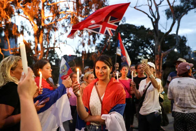 Jelena Stankovic, a supporter of Serbian tennis player Novak Djokovic, rallies with fellow fans outside the Park Hotel, where the star athlete is believed to be held while he stays in Australia, in Melbourne, Australia, January 6, 2022. (Photo by Loren Elliott/Reuters)