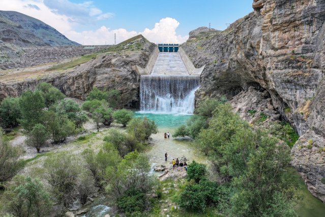 A view of the artificial waterfall at the end of the channel used for water discharge at Zernek Dam where the water level has reached 100% due to recent rains in Van, Turkiye on June 9, 2024. (Photo by Ozkan Bilgin/Anadolu via Getty Images)