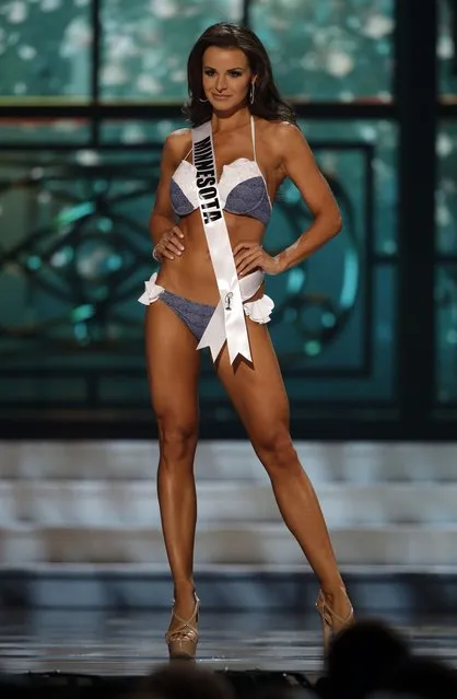 Miss Minnesota, Jessica Scheu, competes in the bathing suit competition during the preliminary round of the 2015 Miss USA Pageant in Baton Rouge, La., Wednesday, July 8, 2015. (Photo by Gerald Herbert/AP Photo)