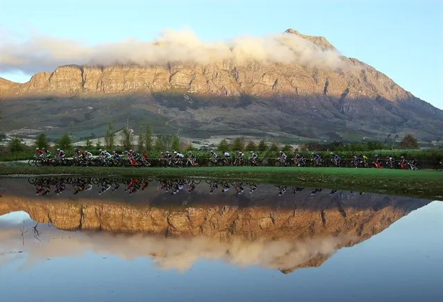 The peleton is on the way during the  103km Stage 3 of the 2016 ABSA Cape Epic mountain bike race near Wellington, South Africa, 16 March 2016. The ABSA Cape Epic is often described as the “Tour de France” of mountain biking and will see 1,200 riders racing over 652km in eight stages and 15,100m of climbing. UCI professional racers ride alongside amateur riders during the eight day long race. (Photo by Kim Ludbrook/EPA)