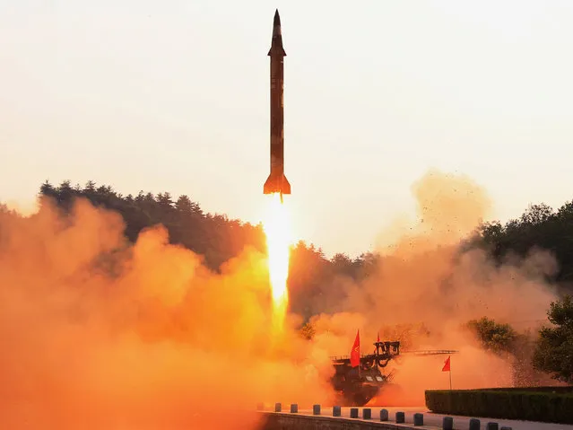 A ballistic rocket is test-fired through a precision control guidance system in this undated photo released by North Korea's Korean Central News Agency (KCNA) May 30, 2017. (Photo by KCNA/Reuters)