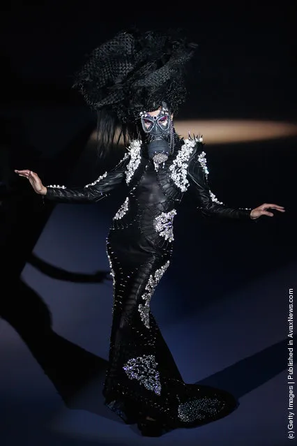 A model showcases designs on the catwalk during She guang Hu Collection of China Fashion Week A/W 2012/13 at 751D.Park Central Hall