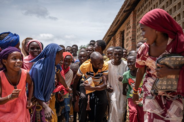 Students at the Nguerendomo Primary School take part in a series of fun activities led by the school director Brice Nguilibet in Birao on August 12, 2024. Owing to the widespread nature of gender-based violence, conflict and other extreme factors, many of the children in Korsi are traumatized. The fighting in Sudan, which has killed tens of thousands and displaced a fifth of the population, has continued unabated despite the ongoing mediation efforts. Both forces have been accused of war crimes, including targeting civilians, indiscriminately shelling residential areas and looting or obstructing aid. (Photo by Amaury Falt-Brown/AFP Photo)