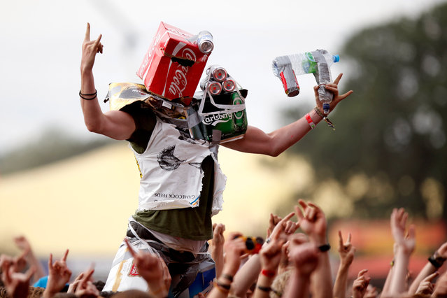 A music fan soaks up the atmopshere as Bullet For My Valentine perform live on the Main Stage on Day Three during the Reading Festival 2012 at Richfield Avenue on August 26, 2012 in Reading, England. (Photo by Simone Joyner/Getty Images)