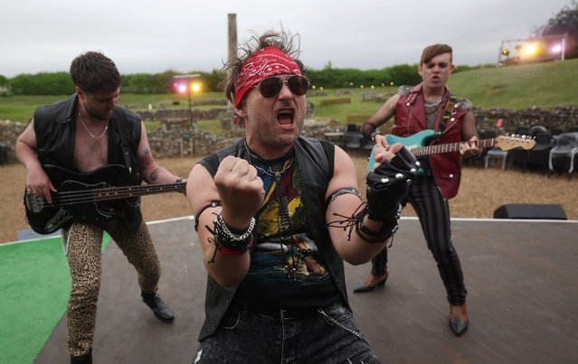 Cast members rehearse for a production of Shakespeare’s “Merry Wives of Windsor”, set in the 1980s, at The Roman Theatre of St Albans, Britain, on May 31, 2024. (Photo by Suzanne Plunkett/Reuters)