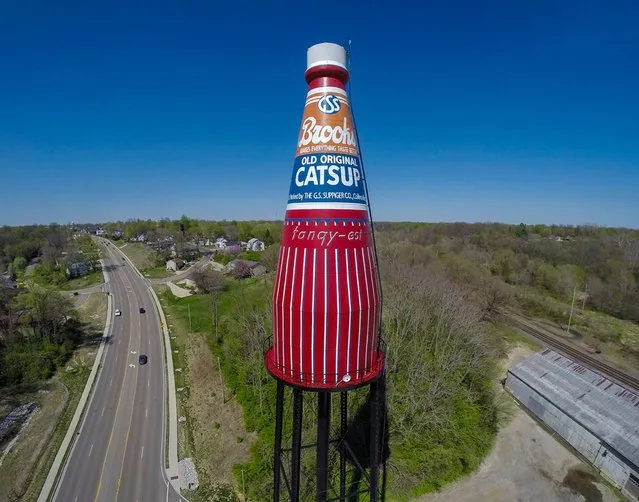 A water tower shaped like a ketchup bottle is seen in the town of Belleville, Illinois in a March 2014 photo. A water tower shaped like a 170-foot-tall ketchup bottle is for sale in southern Illinois, along with an adjacent warehouse, an owner said on July 23, 2014. Fans fear the 65-year-old landmark, which is on the National Register of Historic Places, might be in peril if a sympathetic buyer isn't found. (Photo by Mark Ahlvers/Reuters)