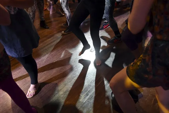 Club-goers dance at “Morning Gloryville” at the Ministry of Sound in south London August 11, 2015. (Photo by Toby Melville/Reuters)