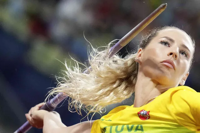 The hair of Liveta Jasiunaite, of Lithuania, twists itself around her javelin as she makes an attempt in the Women's javelin throw final during the athletics competition in the Olympic Stadium at the European Championships in Munich, Germany, Saturday, August 20, 2022. (Photo by Matthias Schrader/AP Photo)