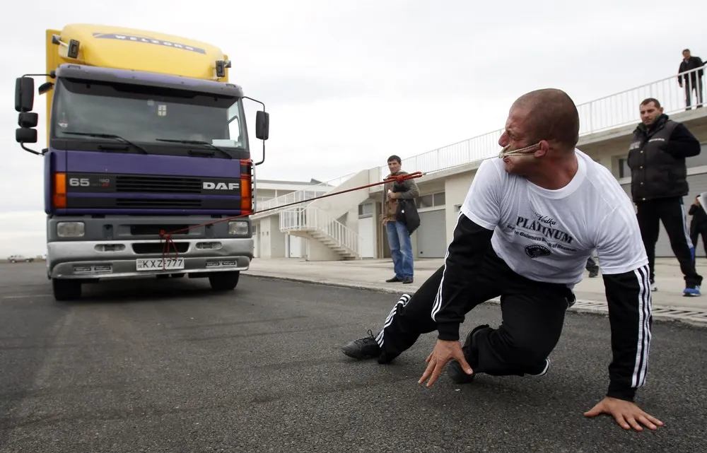 Lasha Pataraia Pulls Eight-ton Truck with his Ear