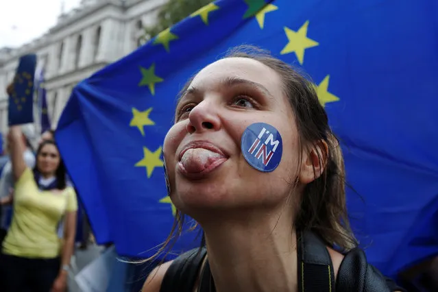 A Pro-Europe demonstrator reacts to Brexit supporters on route during a “March for Europe” protest against the Brexit vote result earlier in the year, in London, Britain, September 3, 2016. (Photo by Luke MacGregor/Reuters)